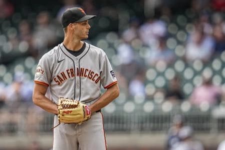 San Francisco Giants relief pitcher Tyler Rogers (71) pitches against the Atlanta Braves during the ninth inning at Truist Park.