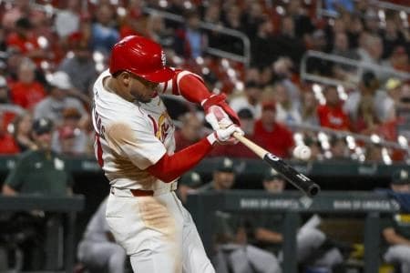 St. Louis Cardinals first baseman Willson Contreras (40) hits a two run triple against the Athletics during the eighth inning at Busch Stadium.