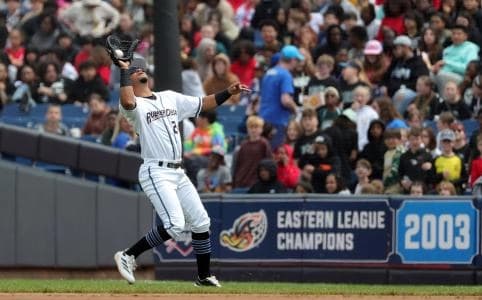 Akron RubberDucks first baseman Jorge Burgos (24) gets under a fly ball hit by Altoona Curve centerfielder Mitch Jebb (19) during the sixth inning of an MiLB baseball game at Canal Park on Tuesday, May 20, 2025, in Akron, Ohio.