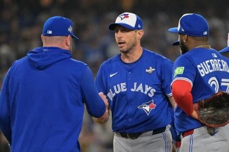 Toronto Blue Jays manager John Schneider (14) relieves pitcher Max Scherzer (31) in the fifth inning against the Los Angeles Dodgers during game three of the 2025 MLB World Series at Dodger Stadium