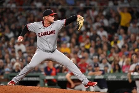 Cleveland Guardians relief pitcher Nic Enright (59) pitches against the Boston Red Sox during the sixth inning at Fenway Park.