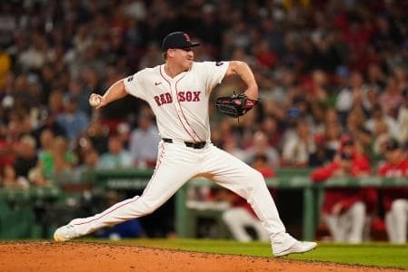 Boston Red Sox relief pitcher Josh Winckowski (25) throws a pitch against the Baltimore Oriolesn in the seventh inning at Fenway Park.