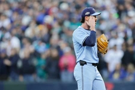 Toronto Blue Jays pitcher Shane Bieber (57) reacts after giving up a double during the first inning against the Seattle Mariners during game three of the ALCS round for the 2025 MLB playoffs at T-Mobile Park.