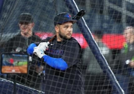 Toronto Blue Jays shortstop Bo Bichette (11) takes batting practice before a game against the Baltimore Orioles at Rogers Centre.