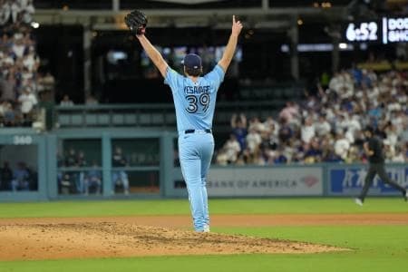 Toronto Blue Jays starting pitcher Trey Yesavage (39) celebrates during game five of the 2025 MLB World Series against the Los Angeles Dodgers at Dodger Stadium.