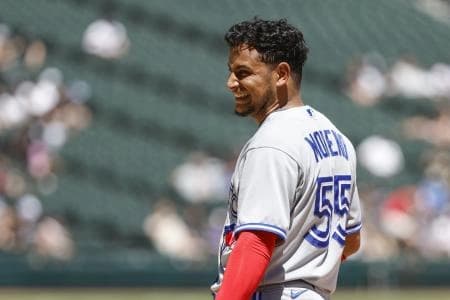 Toronto Blue Jays catcher Gabriel Moreno (55) smiles after hitting a single against the Chicago White Sox during the fourth inning at Guaranteed Rate Field.