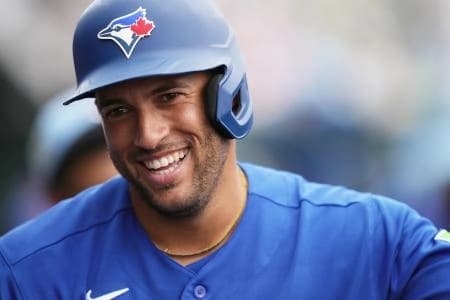Toronto Blue Jays designated hitter George Springer (4) celebrates a home run in the first inning against the Miami Marlins at Roger Dean Chevrolet Stadium.
