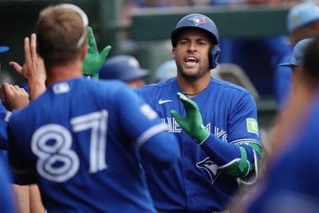 Toronto Blue Jays designated hitter George Springer (4) celebrates a home run in the first inning against the Miami Marlins at Roger Dean Chevrolet Stadium