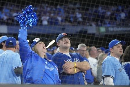 Fans cheer in the eighth inning between the Toronto Blue Jays and the Los Angeles Dodgers during game seven of the 2025 MLB World Series at Rogers Centre.
