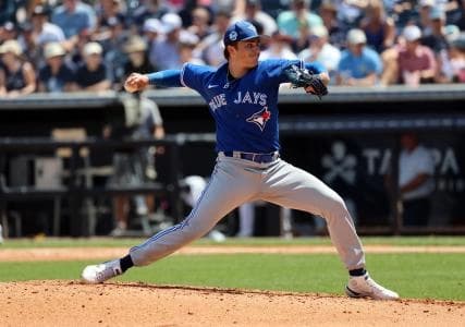 Toronto Blue Jays pitcher T.J. Brock (77) throws a pitch during the sixth inning against the New York Yankees at George M. Steinbrenner Field.