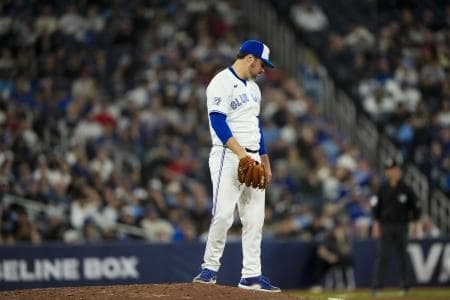 Toronto Blue Jays Brendon Little (54) reacts after giving up a hit during the sixth inning against the Colorado Rockies at Rogers Centre.