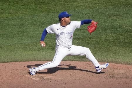 Toronto Blue Jays pitcher Lazaro Estrada (60) pitches to the Los Angeles Angels during the seventh inning at Rogers Centre.