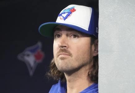 Toronto Blue Jays pitcher Kevin Gausman (34) looks on before a game against the Athletics at Rogers Centre.