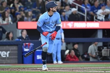 Toronto Blue Jays second baseman Ernie Clement (22) hits an RBI double against the Colorado Rockies in the seventh inning at Rogers Centre.