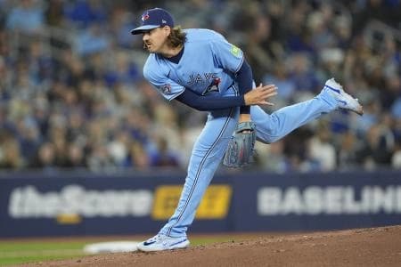 Toronto Blue Jays starting pitcher Kevin Gausman (34) pitches to the Colorado Rockies during the second inning at Rogers Centre.