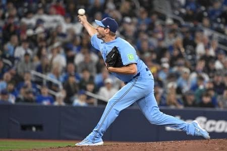 Toronto Blue Jays starting pitcher Max Scherzer (31) delivers a pitch against the Colorado Rockies in the first inning at Rogers Centre.