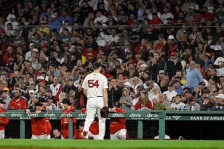 Boston Red Sox starting pitcher Lucas Giolito (54) is relieved of pitching duties during the fifth inning against the Athletics at Fenway Park.