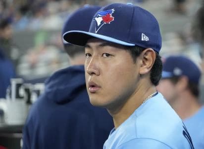 Toronto Blue Jays third baseman Kazuma Okamoto (7) before a game against the Colorado Rockies at Rogers Centre.