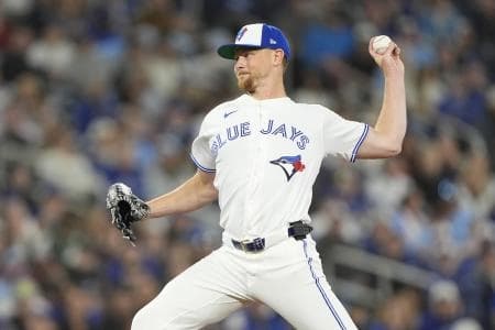 Toronto Blue Jays starting pitcher Eric Lauer (56) pitches to the Athletics during the third inning at Rogers Centre.