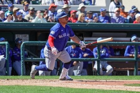 Toronto Blue Jays catcher Alejandro Kirk (30) watches a fly ball during the third inning against the Detroit Tigers at Publix Field at Joker Marchant Stadium.