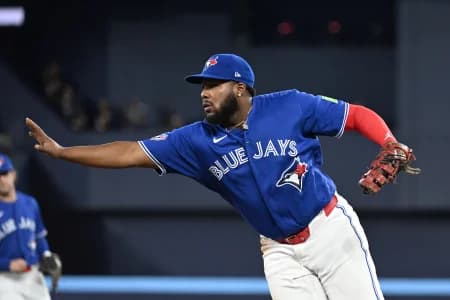 Toronto Blue Jays first baseman Vladimir Guerrero Jr. (27) waves off assistance as he makes a solo put out against the Los Angeles Dodgers in the fifth inning at Rogers Centre.