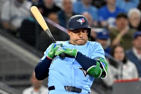 Toronto Blue Jays designated hitter George Springer (4) reacts to a high inside pitch from Colorado Rockies relief pitcher Juan Mejia in the fifth inning at Rogers Centre.