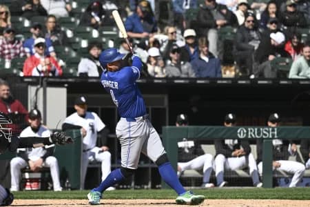 Toronto Blue Jays right fielder George Springer (4) singles during the fifth inning against the Chicago White Sox at Rate Field.