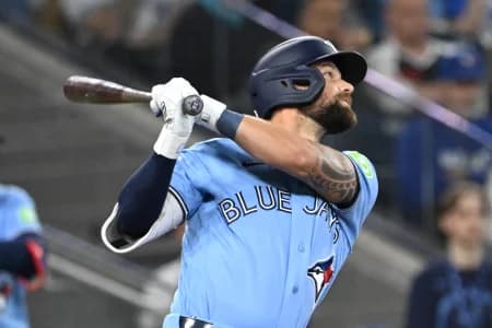 Toronto Blue Jays right fielder Nathan Lukes (38) hits single against the Colorado Rockies in the fifth inning at Rogers Centre