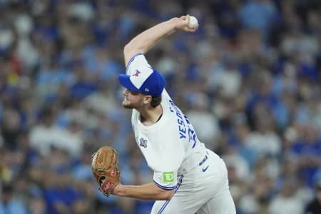 Toronto Blue Jays pitcher Trey Yesavage (39) pitches against the Los Angeles Dodgers in the seventh inning during game seven of the 2025 MLB World Series at Rogers Centre.