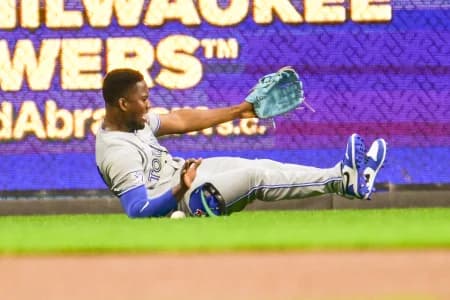Toronto Blue Jays left fielder Jesus Sanchez (12) can't catch ball hit by Milwaukee Brewers designated hitter William Contreras (not pictured) for a single in the first inning at American Family Field.