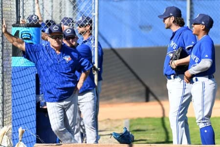 Toronto Blue Jays manager Josh Gibbons (5) talks with Toronto Blue Jays pitcher Marcus Stroman (6) and Toronto Blue Jays pitcher Jason Grilli (37) during the spring training workout at the Bobby Mattix Training Center.