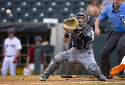 Chicago White Sox catcher Adam Hackenberg plays for the Glendale Desert Dogs during an Arizona Fall League baseball game at Phoenix Municipal Stadium.