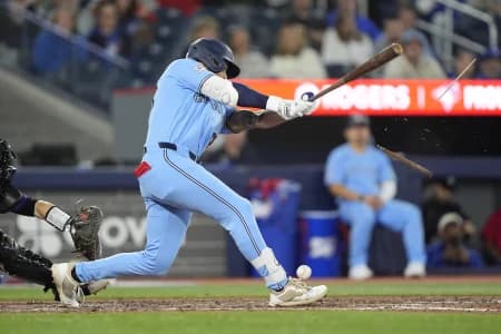 Toronto Blue Jays right fielder Nathan Lukes (38) breaks his bat on a foul ball against the Colorado Rockies during the tenth inning at Rogers Centre.