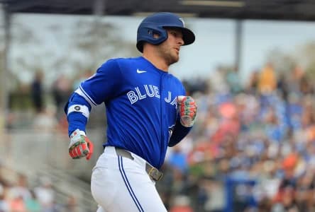 Toronto Blue Jays center fielder Daulton Varsho (5) hits a home run during the fifth inning against the Detroit Tigers at TD Ballpark.