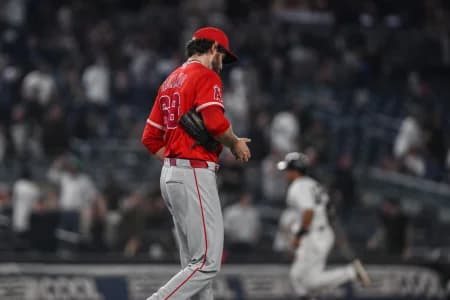 Los Angeles Angels pitcher Jordan Romano (68) reacts after giving up a two run home run to New York Yankees center fielder Trent Grisham (not pictured) during the ninth inning at Yankee Stadium.