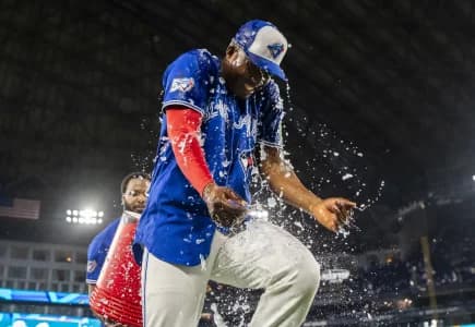 Toronto Blue Jays right fielder Jesús Sánchez (12) gets BodyArmor dumped by baseman Vladimir Guerrero Jr. (27) after defeating the Cleveland Guardians at Rogers Centre.
