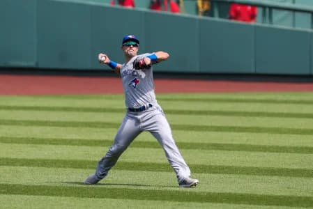 Toronto Blue Jays center fielder Randal Grichuk (15) throws home during the third inning against the Boston Red Sox at Fenway Park.
