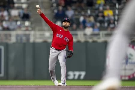 Boston Red Sox second baseman Isiah Kiner-Falefa (2) throws the ball to first base for an out against the Minnesota Twins in the fourth inning at Target Field.