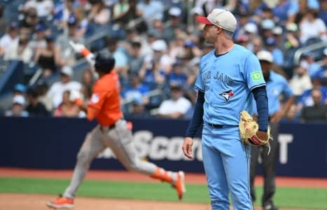 Toronto Blue Jays relief pitcher Trevor Richards looks on as Houston Astros shortstop Jeremy Pena (3) rounds the bases after hitting a solo home run in the seventh inning at Rogers Centre.