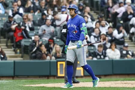Toronto Blue Jays designated hitter George Springer (4) reacts after striking out against the Chicago White Sox during the ninth inning at Rate Field.