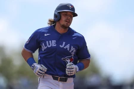 Toronto Blue Jays third baseman Addison Barger (47) runs the bases after hitting a solo home run against the Detroit Tigers in the second inning during spring training at TD Ballpark.