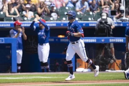 Toronto Blue Jays center Randal Grichuk (15) rounds the bases after hitting a home run during the second inning against the Tampa Bay Rays at Sahlen Field.
