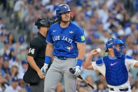 Toronto Blue Jays third baseman Addison Barger (47) reacts after striking out in the second inning against the Los Angeles Dodgers during game three of the 2025 MLB World Series at Dodger Stadium.
