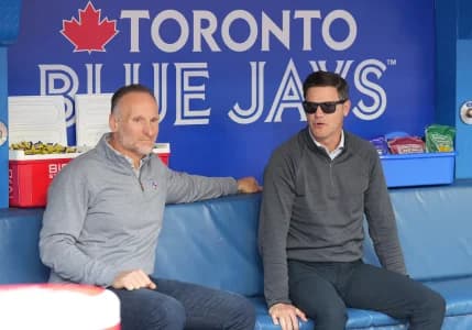 Toronto Blue Jays President CEO Mark A. Shapiro and Toronto Blue Jays Executive Vice President, Baseball Operations General Manager Ross Atkins talk while watching batting practice against the New York Yankees at Rogers Centre.