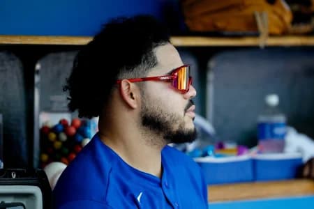 Toronto Blue Jays left fielder Yohendrick Pinango (24) sits in dugout in the seventh inning against the Detroit Tigers at Comerica Park.