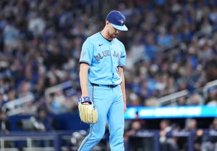 Toronto Blue Jays starting pitcher Eric Lauer (56) walks towards the dugout against the Minnesota Twins during the third inning at Rogers Centre.