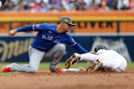 Detroit Tigers center fielder Matt Vierling (8) is tagged out by Toronto Blue Jays shortstop Andres Gimenez (0) trying to steal second in the second inning at Comerica Park.