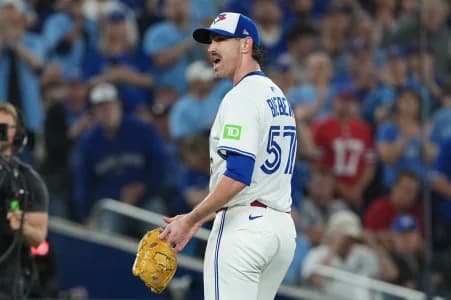Toronto Blue Jays pitcher Shane Bieber (57) is relieved in the fourth inning against the Seattle Mariners during game seven of the ALCS round for the 2025 MLB playoffs at Rogers Centre.