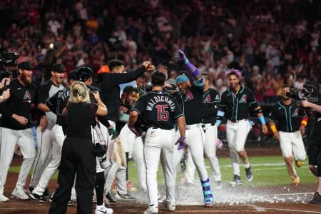 Arizona Diamondbacks second baseman Ketel Marte (4) is doused with water by teammates after hitting a three run walk off home run against the San Francisco Giants during the ninth inning at Chase
