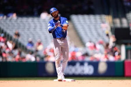 Toronto Blue Jays left fielder Nathan Lukes (38) gestures after hitting an RBI double during the seventh inning against the Los Angeles Angels at Angel Stadium.